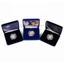 An assortment of three silver proof crown coins to include: 2000 Queen Mother centenary crown; 20...