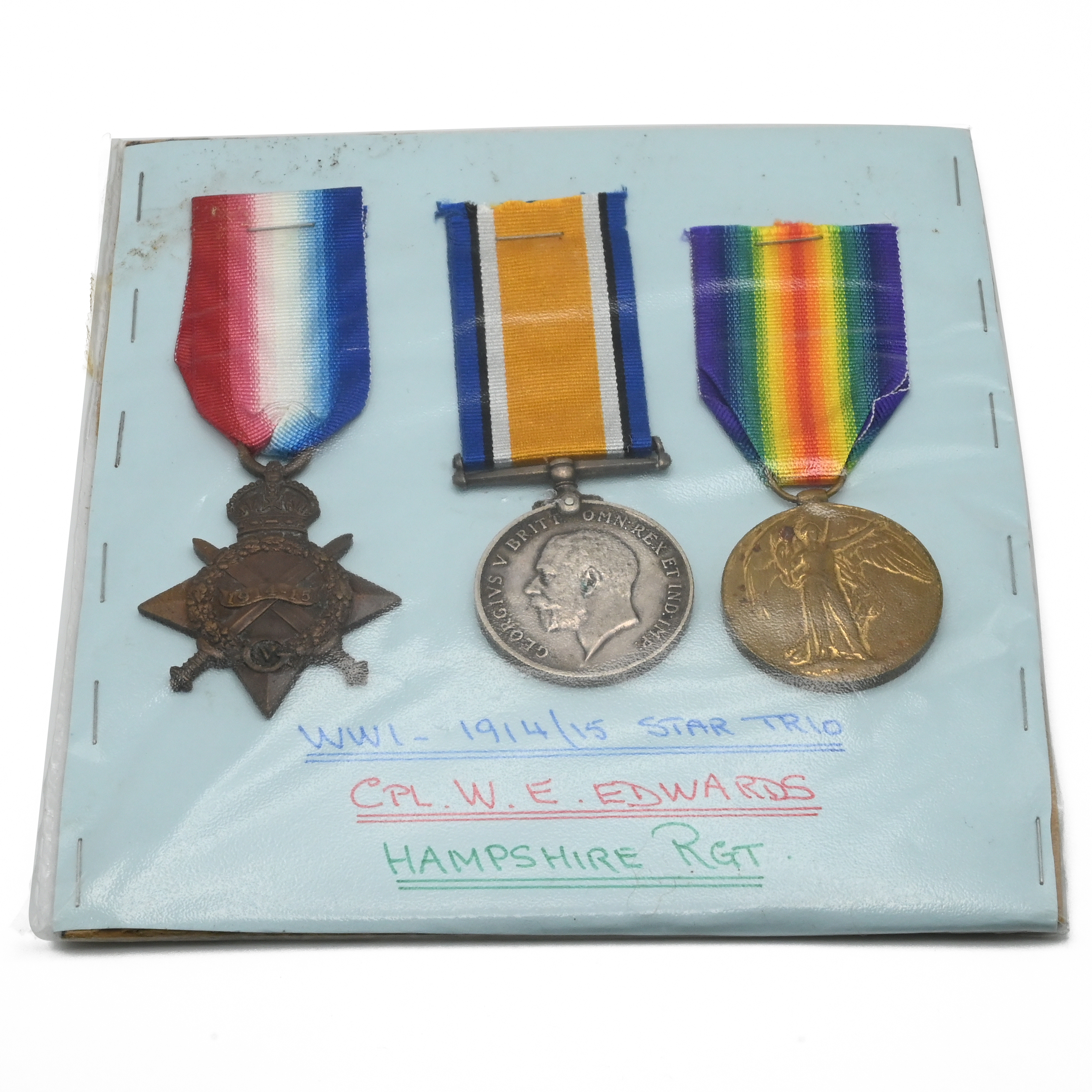 A World War One medal trio comprising a 1914-15 Star, Silver War Medal and a Victory Medal to Cpl...