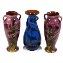 A pair of items of art nouveau Lemon and Crute pottery (Torquay ware) double handed vases, with p...