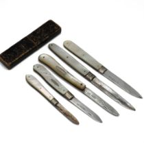 A collection of mother of pearl handled folding fruit knives with silver blades, one Georgian and...
