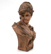 A plaster bust of a young lady after Alfred J Foretay (1861-1944). Modelled wearing a dress with ...