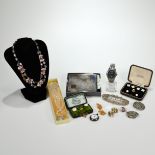 A collection of costume jewellery to include a Victorian silver buckle, two boxed sets of studs a...