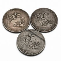 A group of three King George III silver five shillings crown coins, date run of 1818-1820. 1818 L...