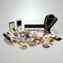 A large quantity of costume jewellery; includes a silver open faced pocket watch; and wristwatches.