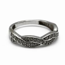 A 9 carat white gold diamond set half hoop ring, the plaited design set with thirty one diamonds ...