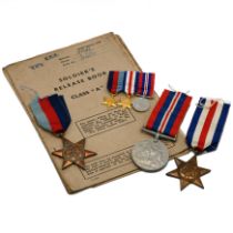 A World War Two group of three medals awarded to 6014519 PTE K F B Stone, comprising: The 1939-19...