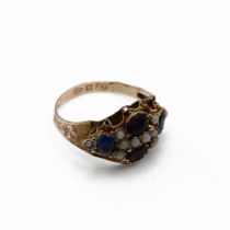 A Victorian 9 carat gold stone set ring, finger size M, 2 grams gross.