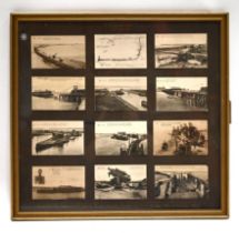 A framed collection of 12 x WW1 related Postcards depicting ruined scenes of Zeebrugge, 23rd Apri...