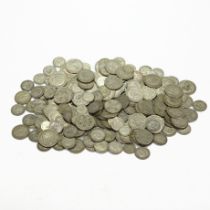 A collection of pre 1947 coins, weighing approximately 1674 grams.