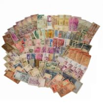 A collection of various bank notes, including Chinese 1000 yen, 10 and 1 yuan, Japanese 10 dollar...