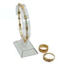 A cubic zirconia set bracelet, stamped ’14K’, 20.5cm long, 6.8 grams gross; a QVC 9 carat gold ca...