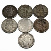 A group of seven United States silver half dollar coins to include: 'Barber' Type - 1899, 1899 (H...