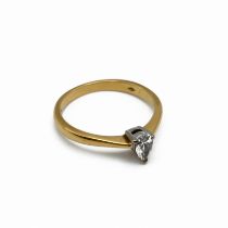 A diamond single stone 18 carat gold ring, the pendelque cut stone of 0.2 carats estimated, finge...