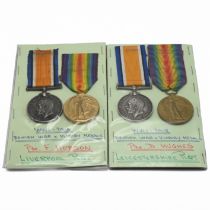 Two groups of World War One medals each comprising a 1914-18 War Medal and a Victory Medal awarde...