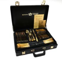 A "Bestecke" gold plated canteen of cutlery by SBS of Solingen, comprising a 12 place setting, in...