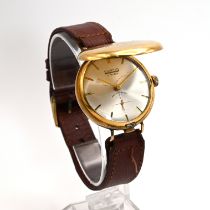 Gentleman's wristwatch in 18ct gold case, monogrammed, with leather strap, the dial marked Curtis...