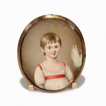 A 19th century memento mori portrait miniature of a young female, painted on ivory, the reverse w...