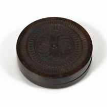 A 20th century rosewood box, with engine turned design to lid. H 2.5cm, L  9cm.