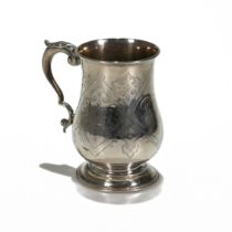 A Victorian silver mug, Henry Holland, London 1867, with strap work cartouches and leaf decoratio...