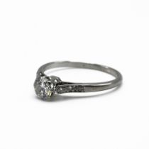 A diamond single stone ring, the white mount unmarked, the brilliant cut of 0.4 carats estimated,...