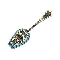 A Russian silver and enamelled sugar spoon, with 84 zolotnik mark only, the shovel bowl with pliq...