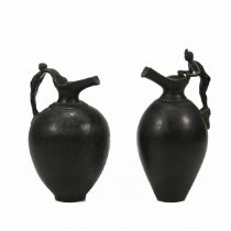 A 19th century bronze Grand Tour bulbous pitcher, the handle formed of reclining classical lady. ...