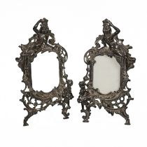 Pair of early 20th Century cast metal standing frames. Decorated in the Rococo style the reverses...