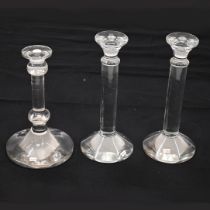 A pair of contemporary large glass candlesticks and a smaller single glass candlestick (3). Pair ...