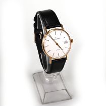 Garrard, a gentleman’s 9 carat gold quartz wrist watch, the signed white dial with gilt black bat...