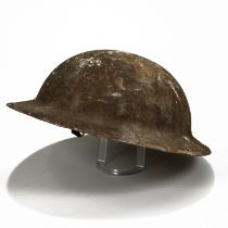 A WW1 2nd Type British Brodie Tin Helmet with rolled edge and sand/rough finish exterior. Origina...