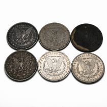 A group of six United States silver 'Morgan' dollars, ( Morgan Dollars were issued between 1878 a...