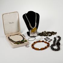 A small collection of costume jewellery items and a ring stamped ’925’, some items signed Mili, K...