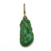 A jade and diamond pendant, the jade carved as a bird and fruit with seven brilliant cuts above,
...