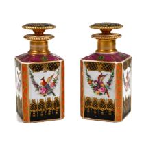 A pair of 19th Century Sèvres tea caddies complete with stoppers, richly illustrated with birds o...