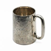 An Edwardian silver mug, by the Haseler Brothers, Chester 1909, the can shaped body with C handle...