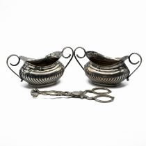 A pair of Edwardian silver salts, Sheffield 1902, 87 grams gross; and a pair of unmarked sugar nips.