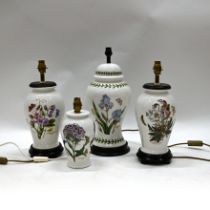 Four Portmeirion ceramic lamps of differing patterns to include: Christmas Rose (41cm); Iris (45....