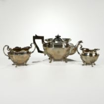 An Edwardian three piece silver tea service, Goldsmiths and Silversmiths Co Ltd, London 1903, of ...