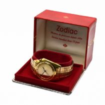 Zodiac, a gentleman’s plated bracelet automatic Mystery watch, the gilt dial with a ‘floating’ ho...