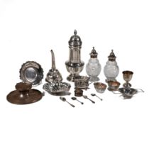 A large silver sugar caster, monogrammed; a pair of silver mounted glass Georgian cruet bottles; ...