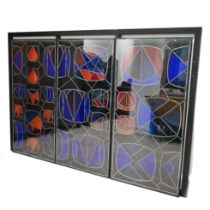 A Trio of stained glass windows of Mackintosh Influence (3) with black painted wood surround c201...