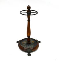 A mahogany and bronze Victorian Stick Stand of circular form, the  circular base supported on thr...