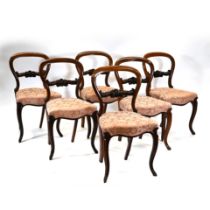 A set of six (6) matching mid 19th Century Walnut carved Balloon back dining chairs c1860s. Each:...