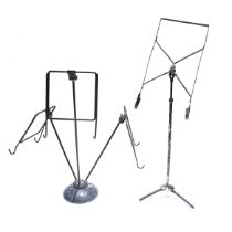 A pair of painted metal tabletop shop/restaurant display stands c1920s. One has a solid base and ...