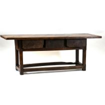 A Country style preparation or scullery table with chamfered legs, rectangular top and three draw...