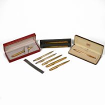 Collection of writing instruments to include: Two 14ct gold nib Parker 75 each with matching ball...