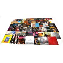 A mixed lot of 5 x Laser Discs and approx. 40 x Vinyl LPs. The laser discs include Whitesnake, Cl...