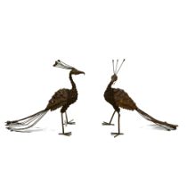 A pair of steel garden secretary bird statues, high 48cm, length 65cm.