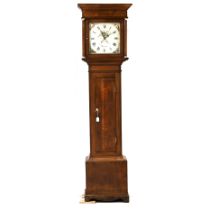 An oak longcase 30 hour clock, late 18th Century, with white enamel dial bearing Roman numerals a...