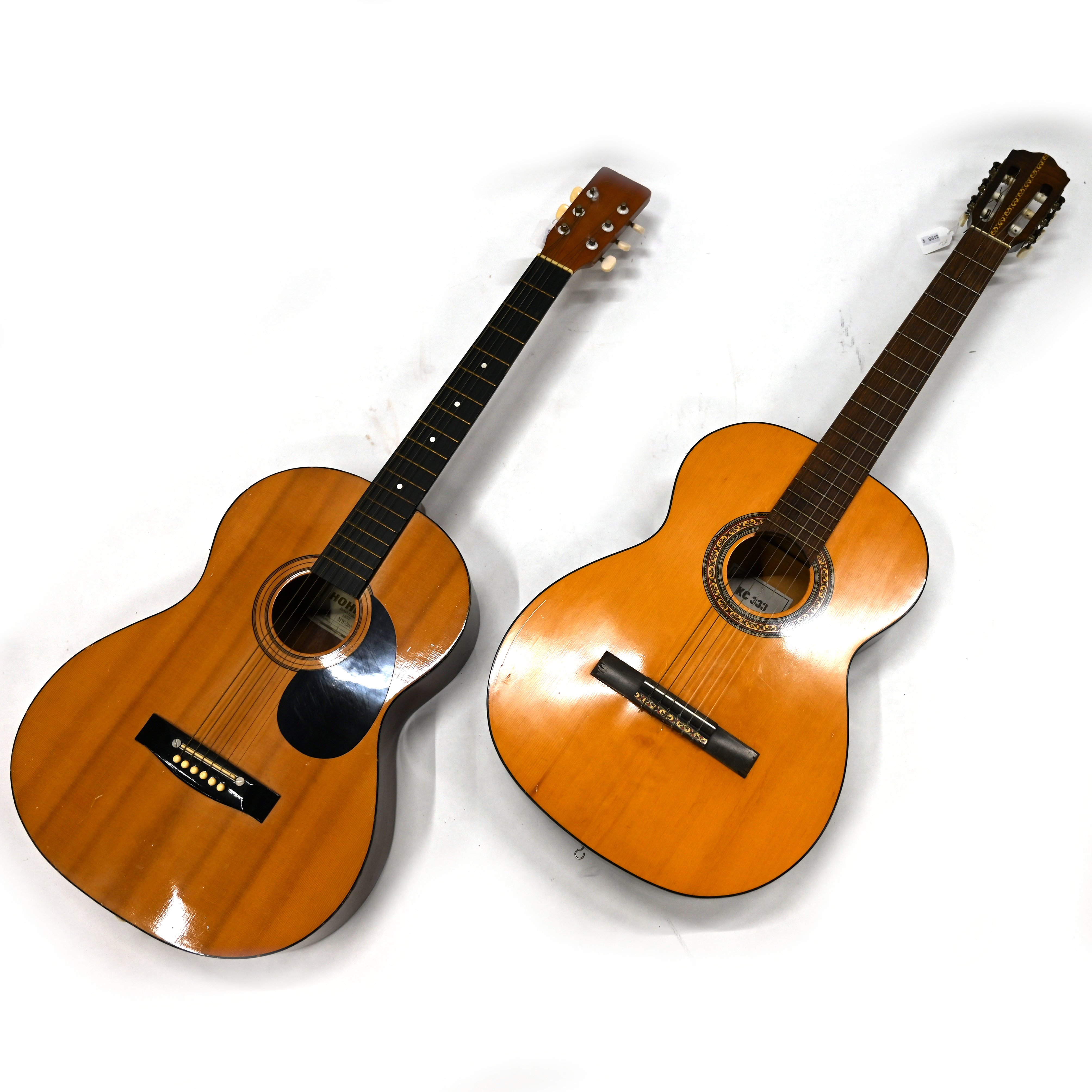 A Horner MW - 300 acoustic guitar, along with a Spanish KC 33 guitar. (2)
